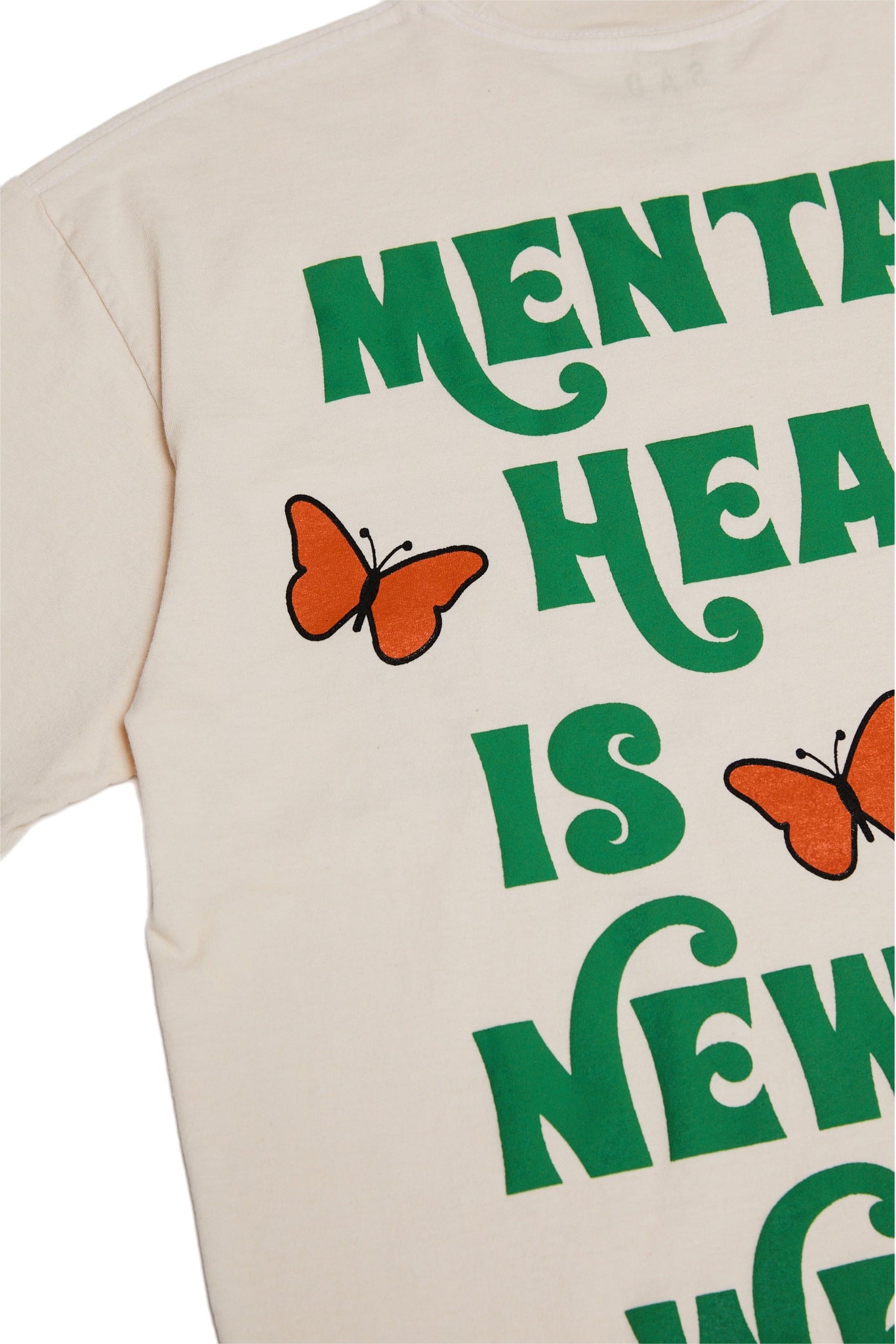 "Mental Health is the New Wealth" T Shirt - Creme